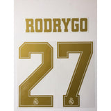 Name Set Número “Rodrygo 27” Real Madrid 2019-20 Para la camiseta de Local y visita/ for Home and Away kits Champions League/Copa del Rey SportingiD